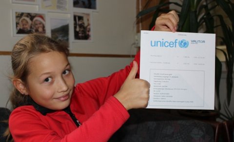 Zlata með kvittunina frá Unicef